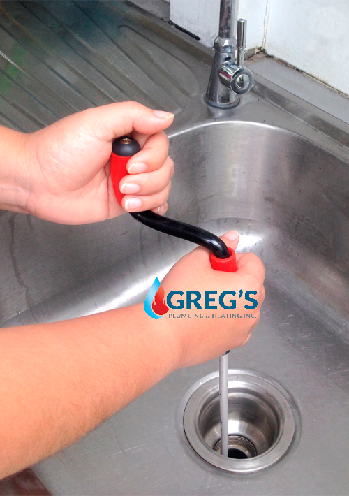 Use a hand auger if plunging does nothing